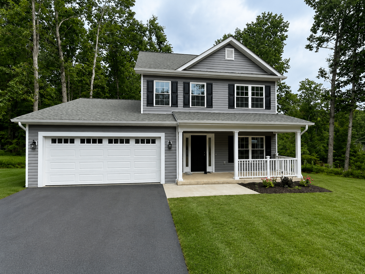 Custom two-story gray home with covered porch and attached two-car garage by Badger Homes